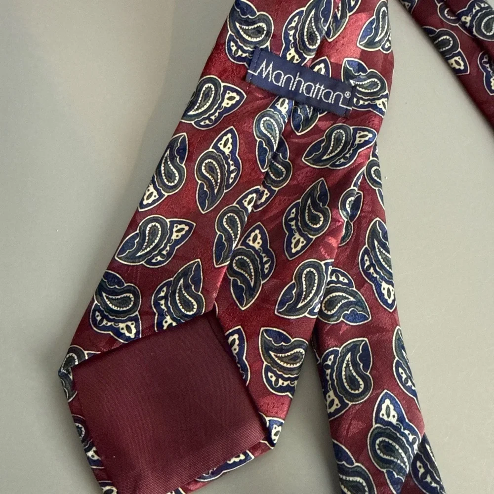 Manhattan Neck Tie necktie featuring a blue and white paisley pattern